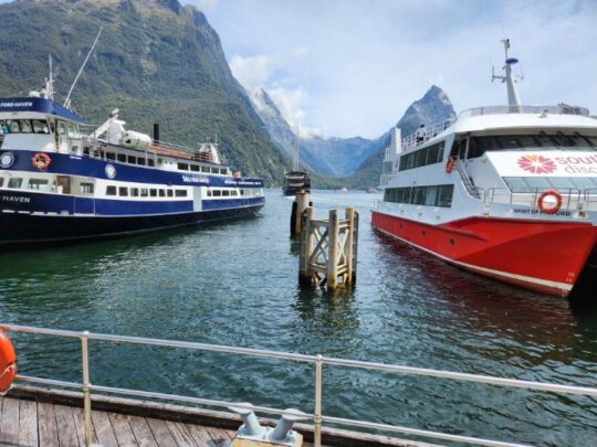 Ships on water, Mountain background